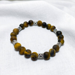 Bracciale elastico in pietra naturale di Occhio di Tigre Opaco Linea Gimo_Jewels Realizzato con pietre dure di Occhio di Tigre non lucidata. Si adatta bene al polso grazie al suo elastico morbido ma resistente e anallergico